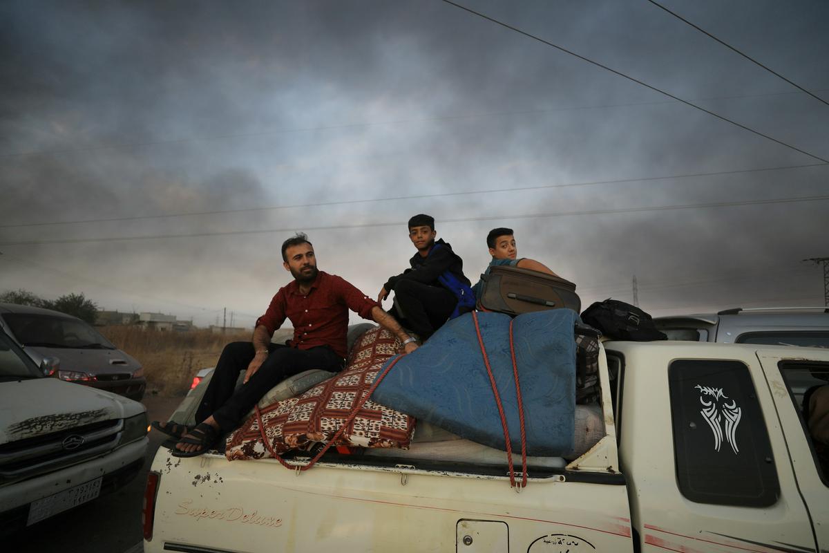 Zaradi vdora turške vojske je na begu na tisoče civilistov. Foto: Reuters