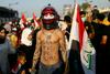 Največji protesti v Iraku po padcu Sadama