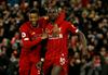 Liverpool kljub povprečni predstavi izenačil rekord z 18. zaporedno zmago