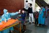 Indija kljub rekordnemu porastu okužb napoveduje sproščanje ukrepov