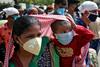 V Indiji potrdili več kot šest milijonov okužb z novim koronavirusom