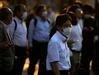 Japonci se potijo pod zaščitnimi maskami med vročinskim valom