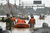 V poplavah na otoku Kjušu umrlo najmanj 44 ljudi