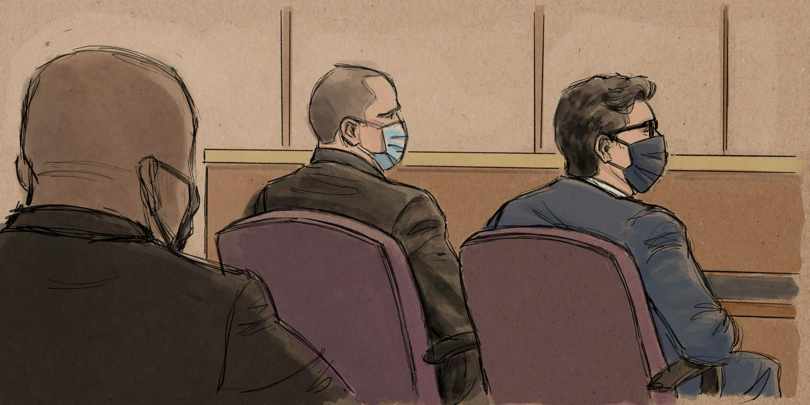 Glavni obtoženec umora Georga Floyda v sodni dvorani z odvetnikom. Foto: Reuters