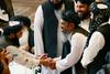 Talibani in afganistanska vlada na zgodovinskih pogajanjih za mir