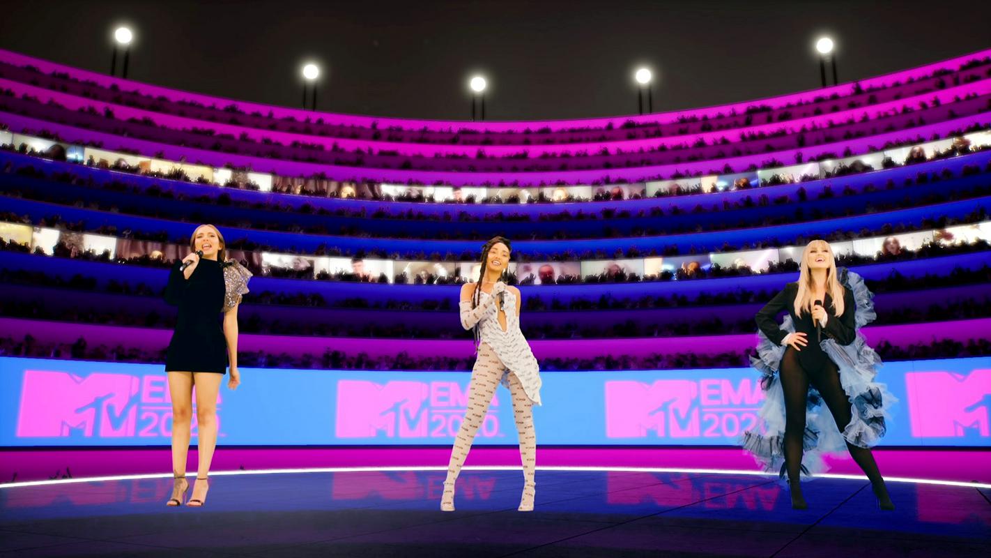 Dogodek, ki ga je povezovala britanska skupina Little Mix, je potekal na virtualnem stadionu, ki je bil poln tudi virtualnih oboževalcev. Foto: Reuters