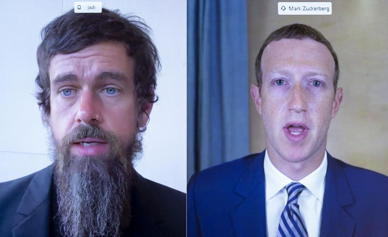 Direktor Twitterja Jack Dorsey (levo) in direktor Facebooka Mark Zuckerberg sta bila novembra lani znova na zaslišanju v ameriškem kongresu, tokrat v povezavi z volitvami. Foto: Reuters