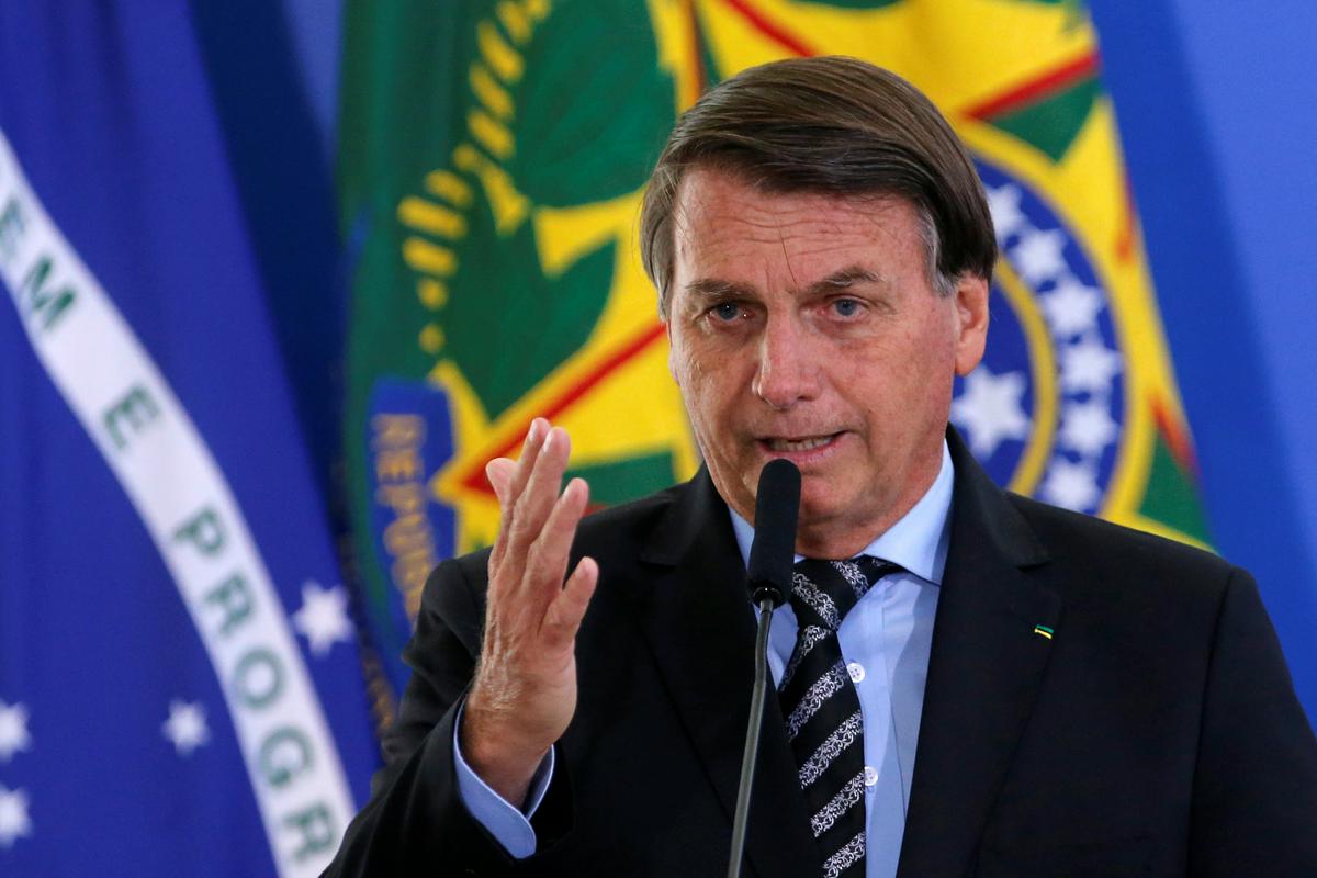 Bolsonaro je izrazil prepričanje, da brazilski parlament ne bo sprejel odločitve o obveznem cepljenju. Foto: Reuters