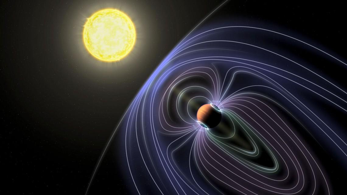 Umetniški pogled na sistem Tau Boötis b. Črte prikazujejo domnevno magnetno polje tamkajšnega planeta. Foto: Nasa