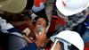 Črna nedelja v Mjanmaru – policija ubila najmanj 18 protestnikov