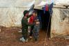Desetletje vojnih grozot v Siriji povzročilo eksodus, opustošenje in nacionalno travmo