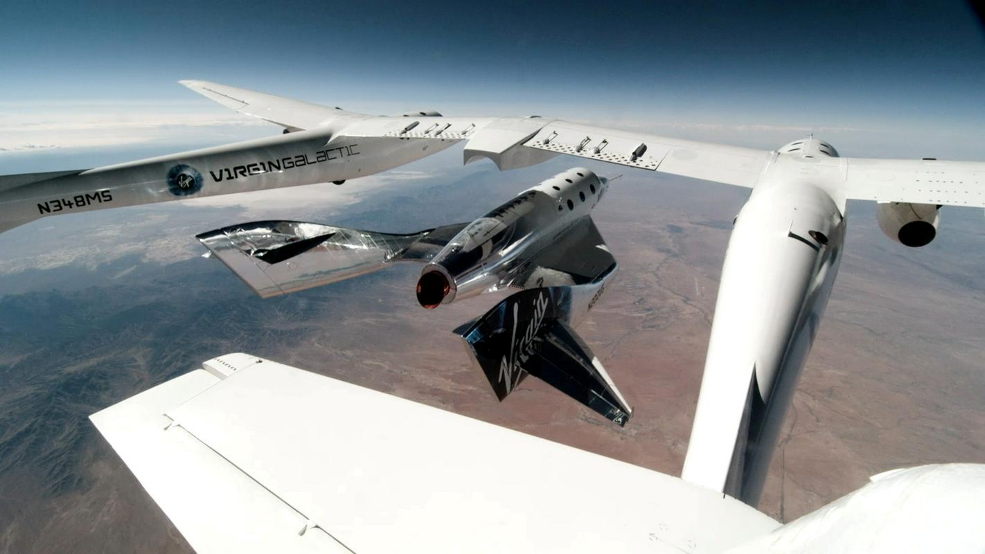 Pri podjetju Virgin Galactic so maja objavili fotografije preizkusa poleta v vesolje. Foto: Reuters