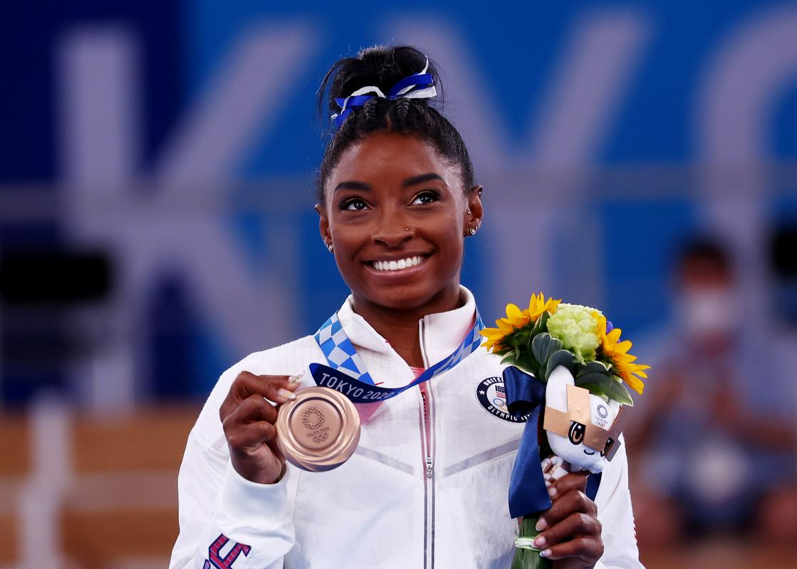 Bilesova je še drugič zapored na olimpijskih igrah v finalu na gredi osvojila bron. Foto: Reuters