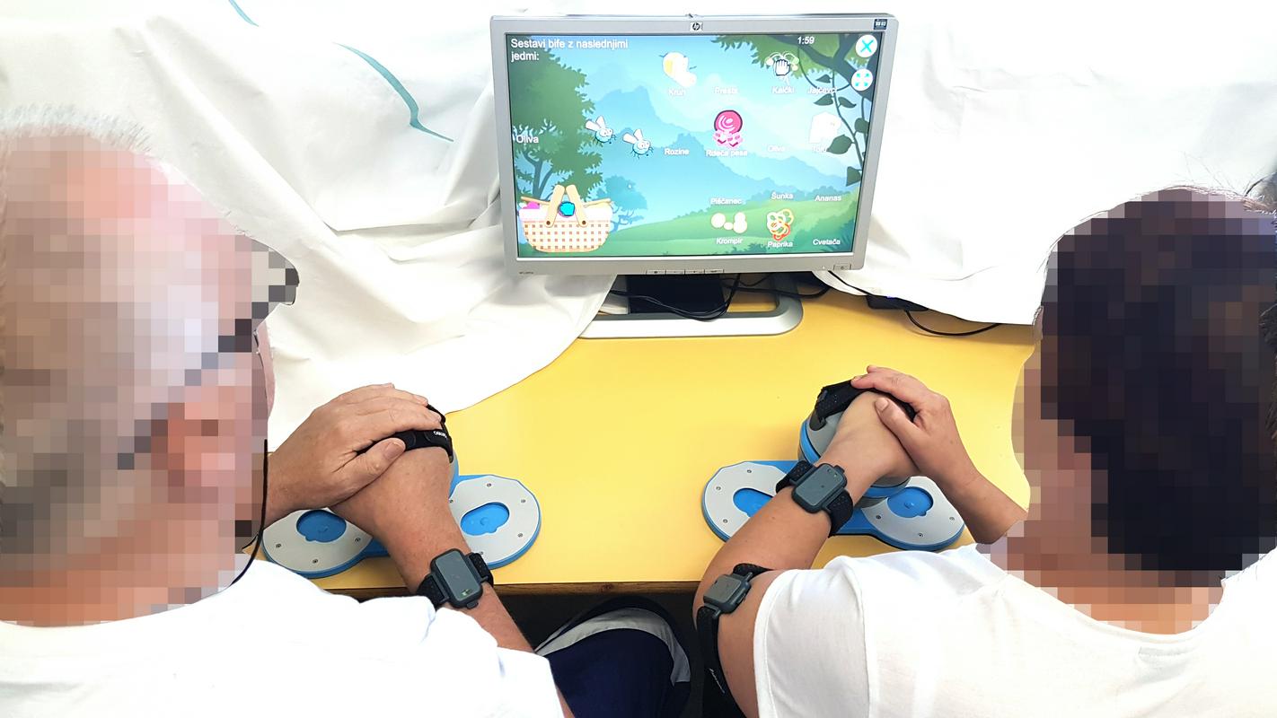 Kooperativne igre so lahko zelo motivirajoče za paciente po možganski kapi. Foto: URI Soča