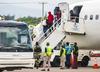 Prebežnike z ameriško-mehiške meje z letali odpeljali na Haiti