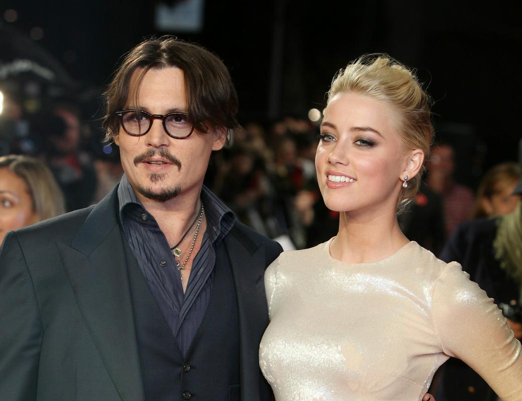 Depp in Heardova sta se spoznala na snemanju filma Zapiti dnevnik leta 2011. Foto: AP