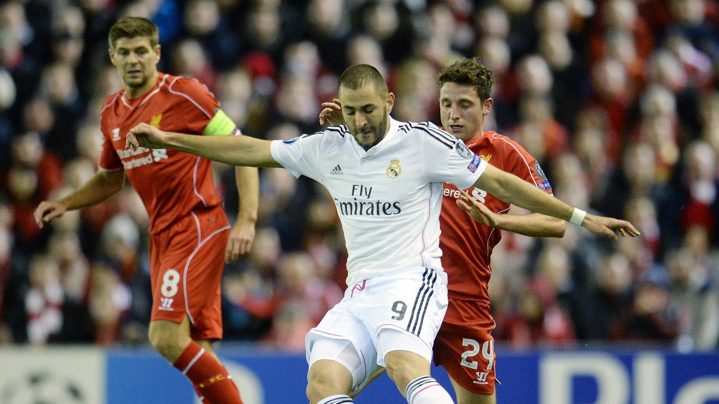 Karim Benzema je leta 2014 potopil Liverpool, glavna nevarnost za vrata Alissona Beckerja bo tudi v soboto v Parizu. Foto: EPA