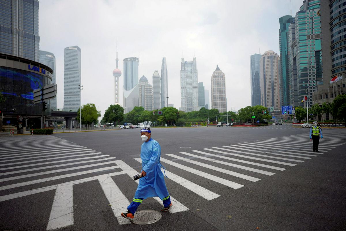 Javno življenje v Šanghaju je bilo za dva meseca povsem ustavljeno. Foto: Reuters