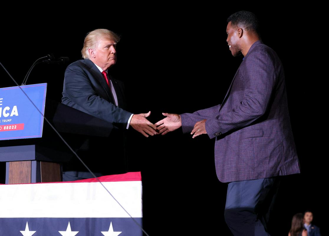Trump je podprl kandidaturo Walkerja. Foto: Reuters