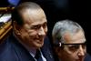 Berlusconi oproščen podkupovanja priče glede spolnega odnosa z mladoletnico