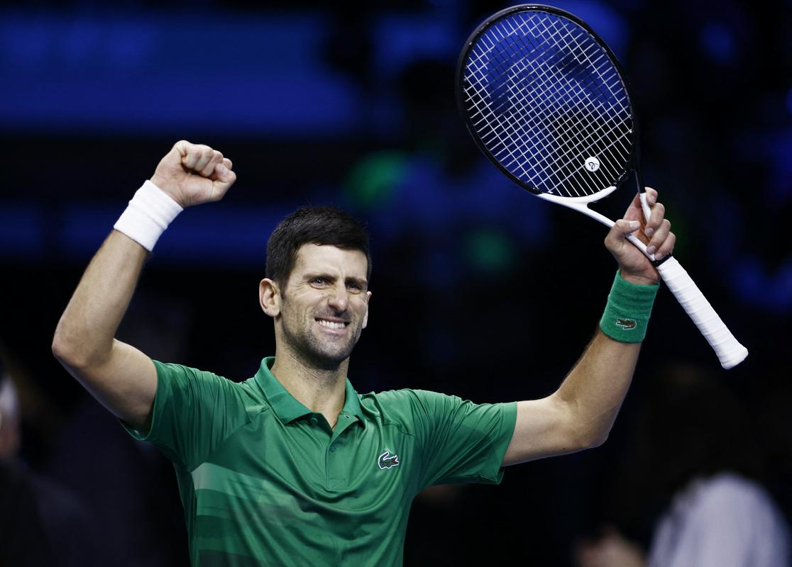 Veselje Novaka Đokovića ob uvrstitvi v osmi finale zaključnega turnirja ATP. Foto: Reuters