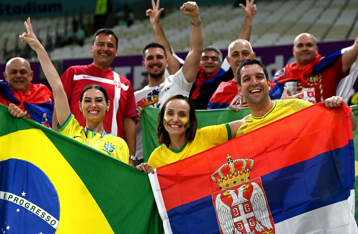 Brazilian and Serbian fans mingled before the match at the Lusail Stadium.  Photo: EPA