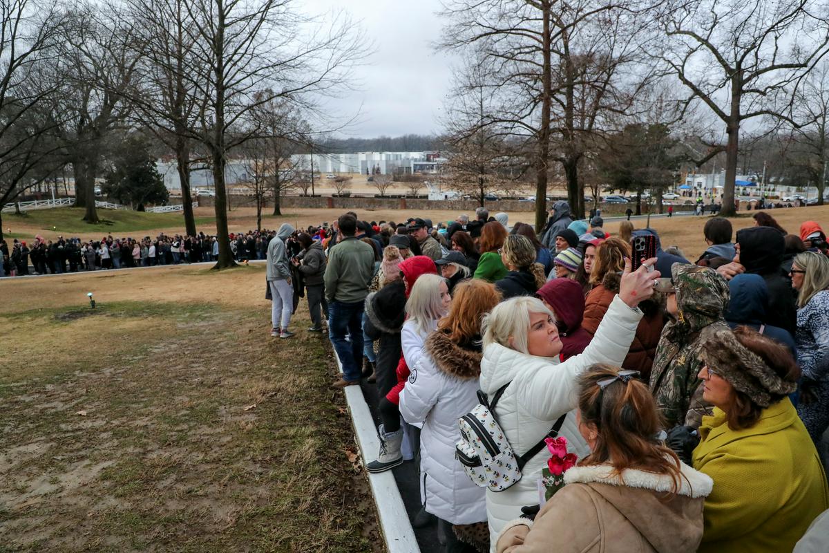 A line of fans, waiting to pay their respects to Lisa Marie at her grave, wound around a large part of the property.  Photo: Reuters