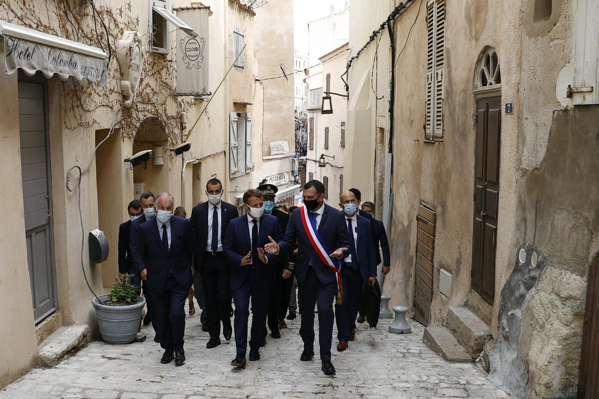 Macron with a delegation visiting Corsica in 2020. Photo: EPA