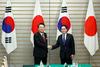 Japonska in Južna Koreja skušata obnoviti vezi in zgladiti trgovinski spor