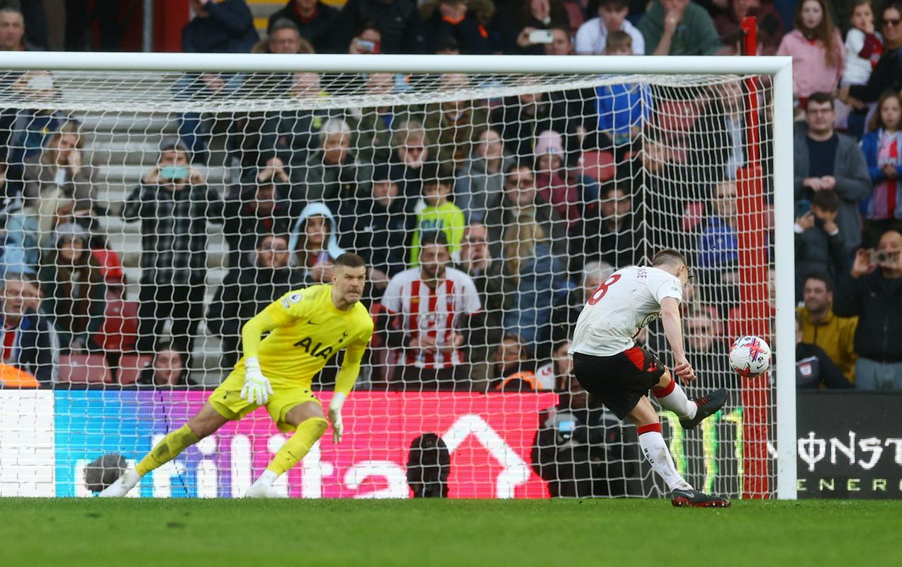 Fraser Forster read the direction of the shot but James Ward-Prowse was too accurate to deny Southampton a big point in their fight for survival.  Photo: Reuters