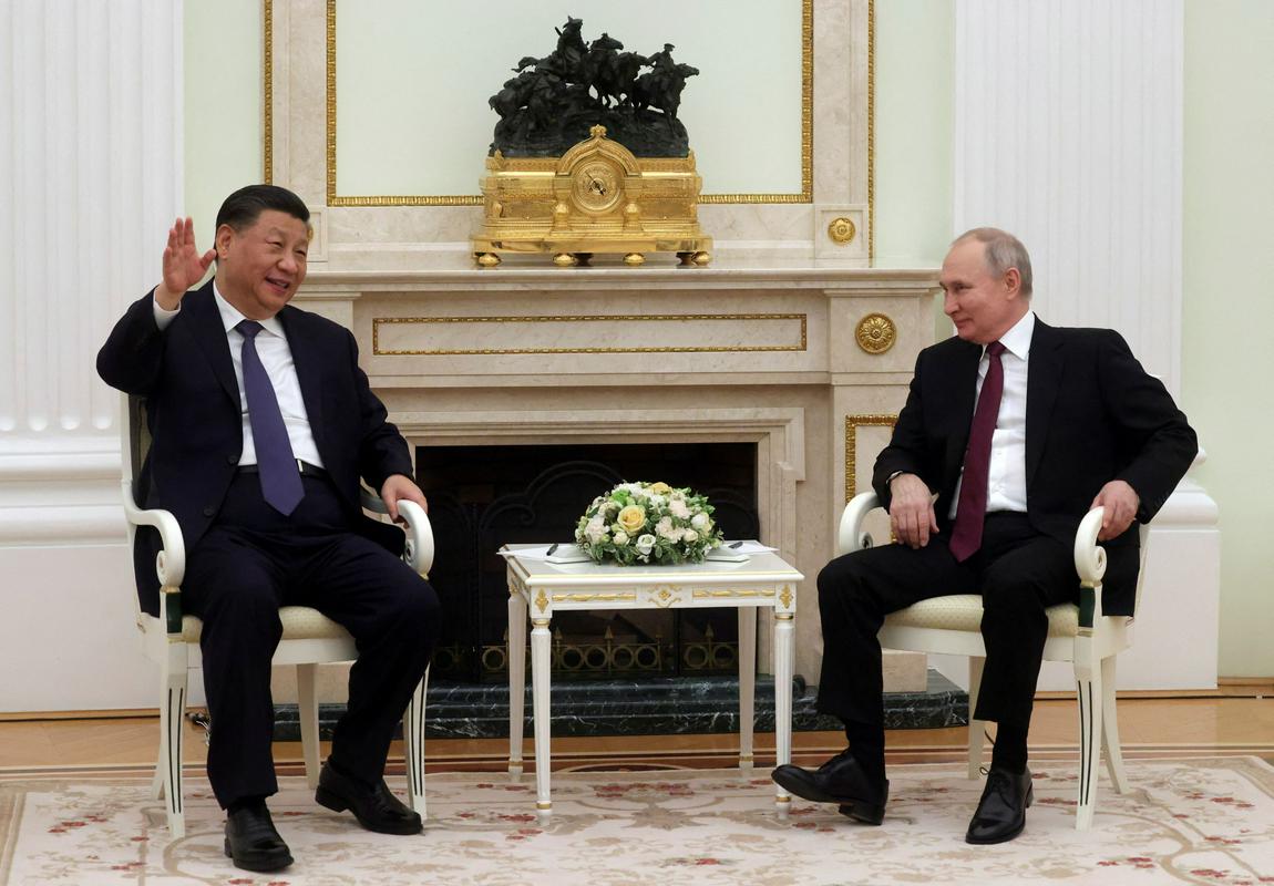 Ši in Putin sta drug drugega označila za dragega prijatelja. Foto: Reuters