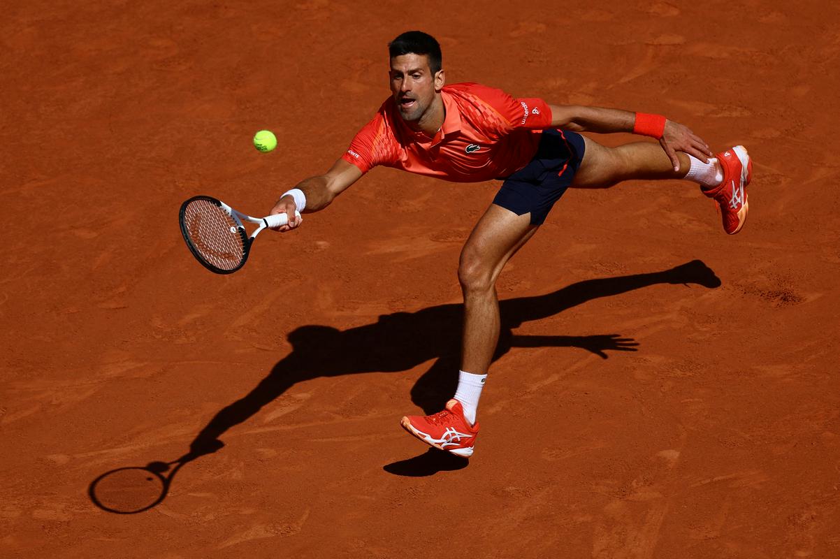 Novak Đoković se je dvanajstič uvrstil v polfinale Pariza, kjer je zmagal dvakrat. To je že njegov 45. polfinale na turnirjih za grand slam.  Foto: Reuters