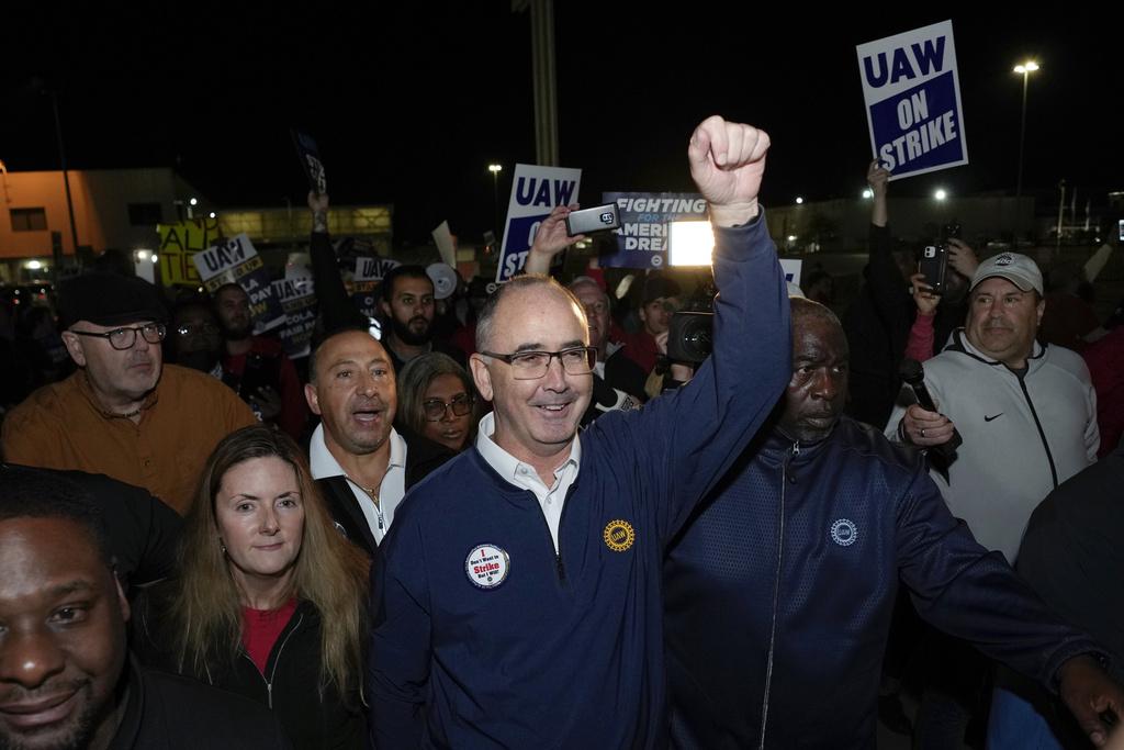 Union president Shawn Fain promised they would 'get their share of the pie'.  Photo: AP