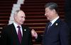 Putin prispel v Peking na vrh pobude Pas in cesta. Srečal se je tudi z Orbanom.