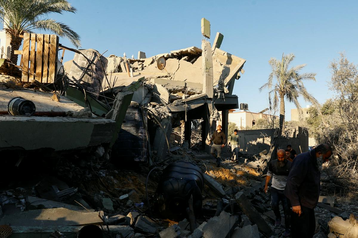 Posledice napada v Kan Junisu. Foto: Reuters