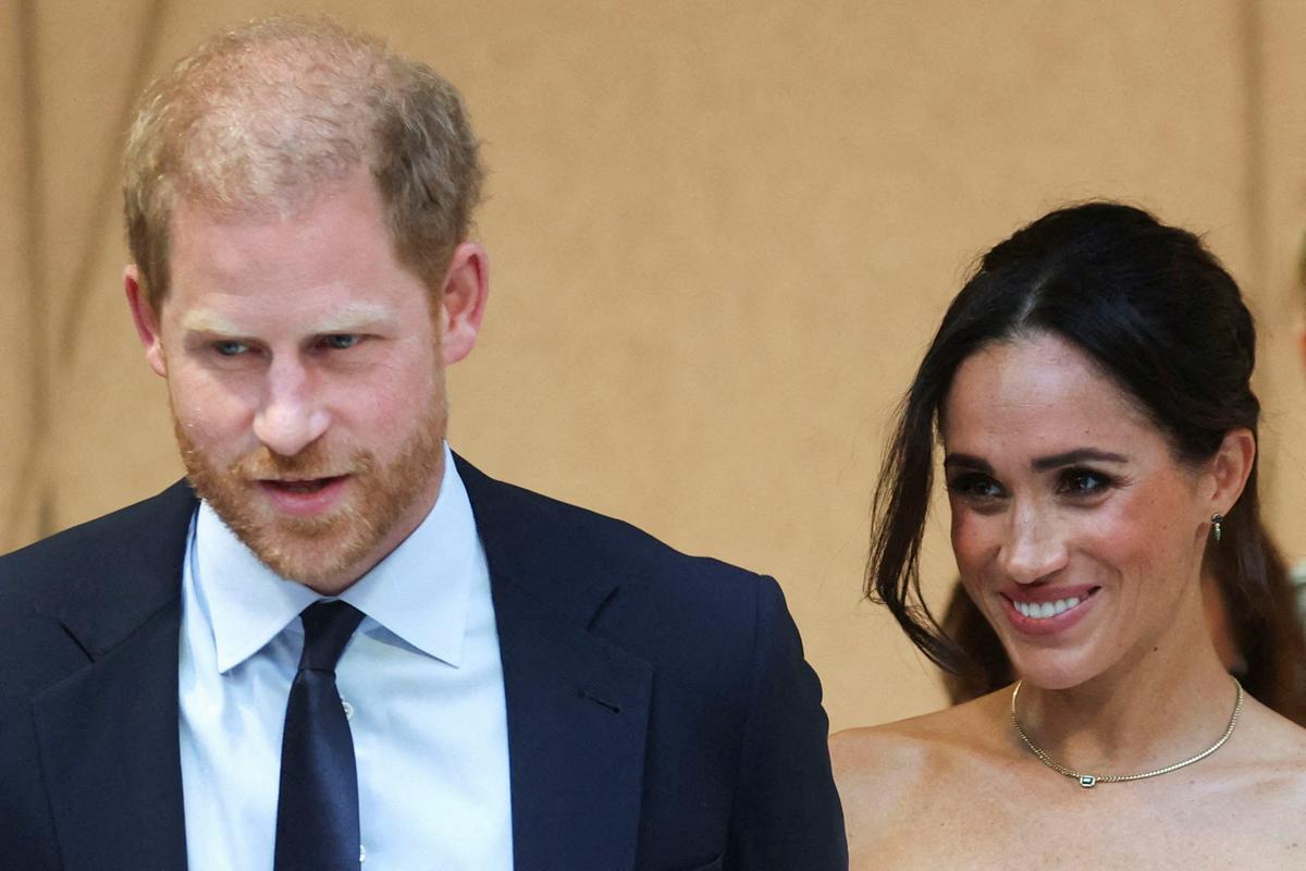 Princ Harry z ženo Meghan. Foto: Reuters