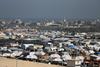 Izrael naj bi iz zraka napadel šotorišče palestinskih beguncev v Rafi