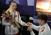 Kitajsko igralko badmintona po osvojeni zlati medalji sotekmovalec zaprosil za roko