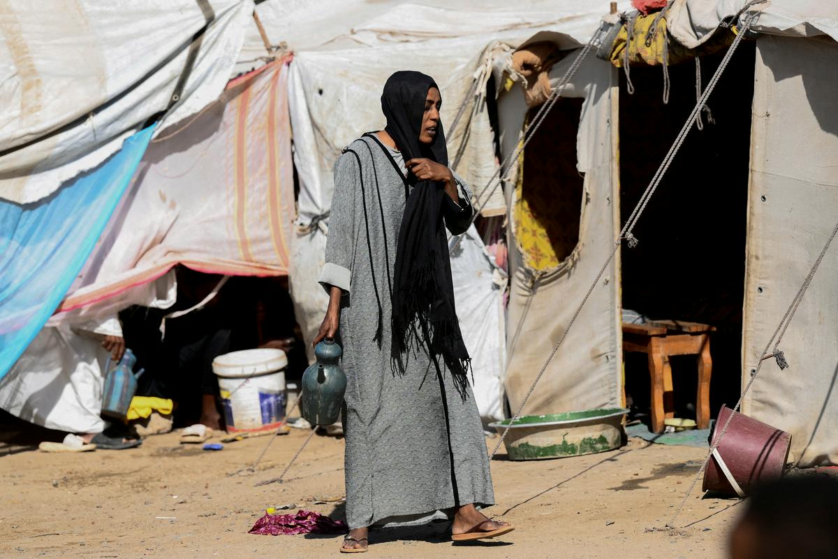 Begunsko taborišče v Port Sudanu. Foto: Reuters Begunsko taborišče v Port Sudanu. Foto: Reuters
