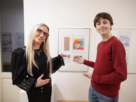 Predstavnica Kabineta poslovodstva in korporativnega komuniciranja Pošte Slovenije mag. Simona Koser Šavora in Niko Štefe Foto: Barbara Reya