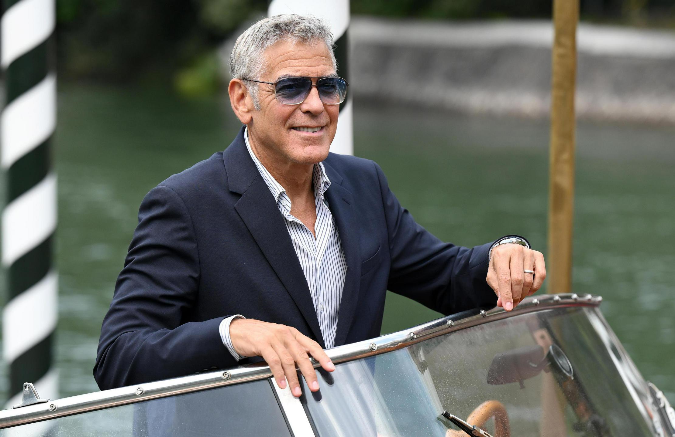 Zvezdniški glamur preteklih dni in izjemna profesionalnost: Clooneyju zlati lev za življenjsko delo